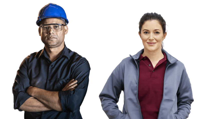 Man with crossed arms, hard hat, and safety glasses next to woman with polo and jacket